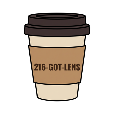 216-GOT-LENS on a coffee cup
